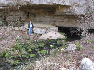 Mike Burrell at the entrance of SMike Burrell at the entrance of Spring Creek Cave, Kendall County, Texas